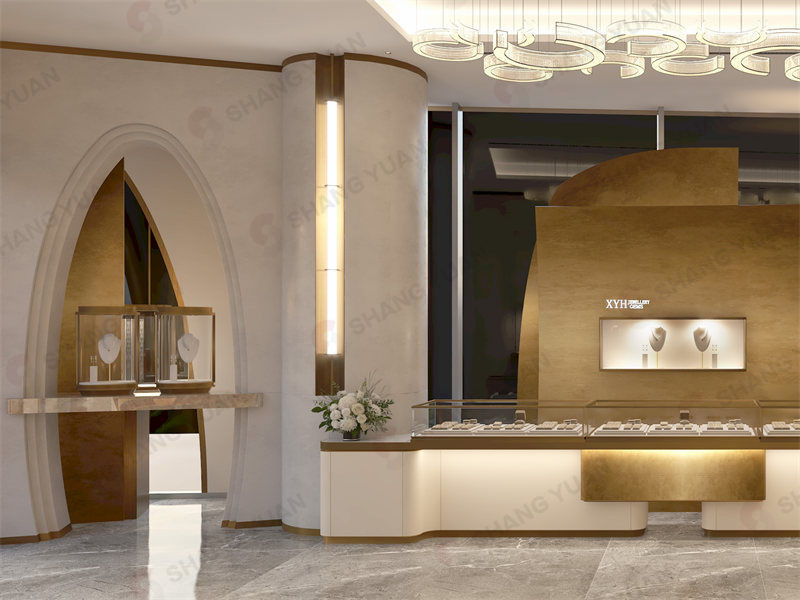Abstract golden wall display with illuminated niches and built-in glass jewelry showcases